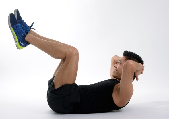 This guy. He's a stock image model. He's pretty good looking. Anyway, we did crunches like this too.